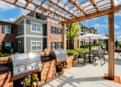Thumbnail 31 of 37 - our apartments have a large patio with a grill and tables at Annandale Apartment Homes, Murfreesboro, 37128