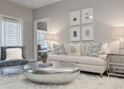 Thumbnail 9 of 37 - a living room with a white rug and a white couch at Annandale Apartment Homes, Murfreesboro, TN, 37128