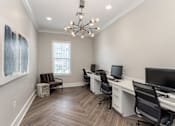 Thumbnail 23 of 37 - a home office with two desks and two computer monitors at Annandale Apartment Homes, Murfreesboro, TN, 37128