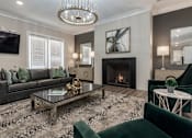 Thumbnail 19 of 37 - a living room with a fireplace and couches at Annandale Apartment Homes, Murfreesboro, Tennessee