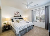 Thumbnail 7 of 27 - Bedroom with cozy bed at Arterra Place Apartments, Colorado 80017