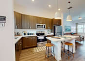 Thumbnail 2 of 57 - Well Equipped Eat-In Kitchen at Artesia at Lakewood Ranch Apartments, Bradenton, FL