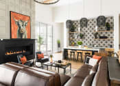 Thumbnail 22 of 33 - clubhouse with couches  at Onyx at Westgate Apartments, Glendale, AZ