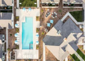 Thumbnail 30 of 33 - view of pool and clubhouse at Onyx at Westgate Apartments, Glendale