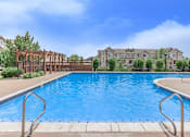 Thumbnail 23 of 31 - Swimming Pool at Black Feather Apartments in Castle Rock, CO