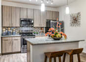 Thumbnail 2 of 65 - Gourmet Kitchen at Centre Pointe Apartments in Melbourne, FL