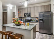 Thumbnail 1 of 65 - Island Kitchen at Centre Pointe Apartments, Melbourne
