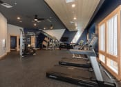 Thumbnail 24 of 39 - a gym with treadmills and other exercise equipment at The Bend Arbordale, Williamsburg, VA, 23188