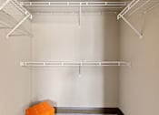 Thumbnail 18 of 34 - closet with white wire shelving at The Millennium Towne Center Apartments, Baton Rouge, LA