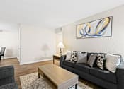 Thumbnail 8 of 29 - a living room with a couch and a coffee table at Diamond  Trail Apartments, Oklahoma