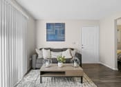Thumbnail 5 of 24 - grey couch and small table in living room