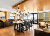 Thumbnail 18 of 35 - a large dining room with a large table and chairs