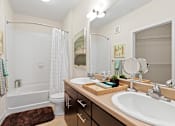 Thumbnail 18 of 48 - our apartments offer a bathroom with a bathtub