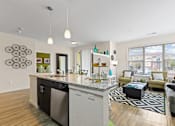 Thumbnail 3 of 48 - our apartments offer a living room with a kitchen and dining area
