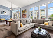 Thumbnail 24 of 48 - couch in clubhouse at Westlink at Oak Station Apartments in Lakewood, CO