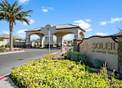 Thumbnail 37 of 37 - a sign for solstice at canyon trail sits in front of a building at Soleil at Canyon Trails Apartments, Goodyear, AZ, 85338
