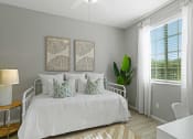 Thumbnail 29 of 43 - a bedroom with a white bed and two pictures on the wall at Sienna at South Mountain Apartments, Arizona, 85339