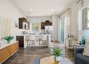 Thumbnail 4 of 33 - a kitchen and living room with a white counter top and a kitchen island at Olive Queen Creek Apartments, Queen Creek, 85142
