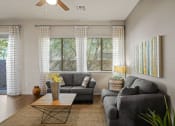 Thumbnail 8 of 36 - a living room with two couches and a coffee table at Bella Grace, Chandler