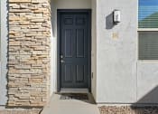Thumbnail 21 of 36 - the front door of a house with a blue door at Bella Grace, Chandler, AZ