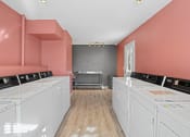 Thumbnail 22 of 29 - washer and dryers in pink room
