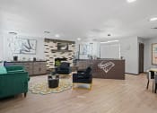 Thumbnail 18 of 29 - large clubhouse with green couch and chairs