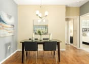 Thumbnail 21 of 49 - a dining room with a table and chairs at Skye at Arbor Lakes, Maple Grove, Minnesota