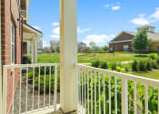 Thumbnail 16 of 49 - a view of the yard from the balcony at Skye at Arbor Lakes, Maple Grove, 55369