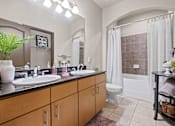 Thumbnail 17 of 34 - bathroom at The Millennium Towne Center Apartments, Baton Rouge, 70806