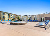 Thumbnail 37 of 48 - our apartments offer a pool and hot tub with lounge chairs