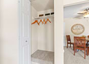 Thumbnail 19 of 40 - the living room and dining room with a dinning room table and chairs at Silver Reef Apartments, Colorado, 80228