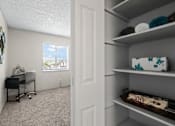 Thumbnail 15 of 35 - a bedroom with a desk and shelves at Park 88 Apartments, Thornton, 80229