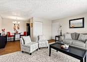 Thumbnail 2 of 35 - a living room with a couch and two chairs at Park 88 Apartments, Thornton