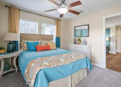 Thumbnail 11 of 38 - a bedroom with a bed and a ceiling fan at 150 Summit, Birmingham, Alabama