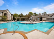Thumbnail 25 of 38 - our apartments have a resort style pool with lounge chairs at 150 Summit Apartments, Alabama