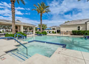 Thumbnail 1 of 3 - Resort style pool with spa and palm trees at Vistoria On Camelback Apartments, Litchfield Park, AZ 85340