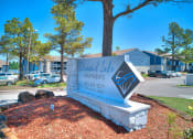 Thumbnail 21 of 24 - the sign at the entrance of dundas lake apartments