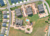 Thumbnail 14 of 14 - arial view of a neighborhood with houses and a pool