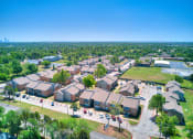 Thumbnail 29 of 29 - an aerial view of a neighborhood with houses and a parking lot at Diamond  Trail Apartments, Oklahoma City, OK, 73112