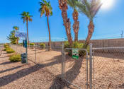 Thumbnail 16 of 26 - a chain link fence with a sign in the middle of it