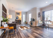 Thumbnail 5 of 35 - Expansive living room with wood style flooring