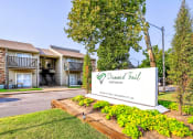 Thumbnail 25 of 29 - our sign is in front of our building with trees and grass at Diamond  Trail Apartments, Oklahoma City, OK, 73112