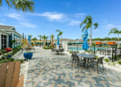 Thumbnail 27 of 36 - Outdoor living space at Estia at Lakewood Ranch, Bradenton, Florida