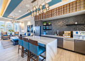 Thumbnail 14 of 36 - Community kitchen and coffee bar at Estia at Lakewood Ranch, Bradenton, FL, 34211