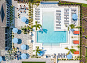 Thumbnail 18 of 36 - Aerial view of the swimming pool and sun deck at Estia at Lakewood Ranch, Bradenton