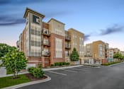 Thumbnail 48 of 50 - Exterior View at Dusk at The Enclave Luxury Apartments