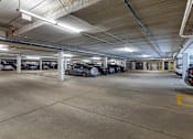 Thumbnail 42 of 50 - the parking garage is filled with parked cars