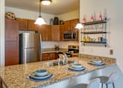 Thumbnail 4 of 50 - Kitchen Island at The Enclave Luxury Apartments