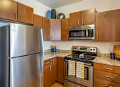 Thumbnail 5 of 50 - Kitchen at The Enclave Luxury Apartments