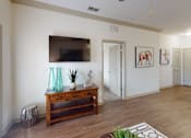Thumbnail 4 of 24 - a spacious living room with a flat screen tv at Integra 360 Apartments, Winter Springs, FL